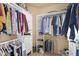 Walk-in closet featuring shelving and bars for hanging clothes at 3859 N El Sereno St, Mesa, AZ 85207