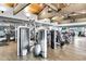 Spacious gym with state-of-the-art weight machines, exercise balls, and ceiling fans for comfortable workouts at 3859 N El Sereno St, Mesa, AZ 85207