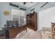 Office features a desk, shutters, and an armchair at 3859 N El Sereno St, Mesa, AZ 85207