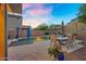 Inviting pool area with patio seating, lush landscaping, and a serene outdoor ambiance at 3859 N El Sereno St, Mesa, AZ 85207