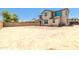Expansive backyard awaiting personal touches and landscaping opportunities on a sunny day at 4277 N 180Th Ln, Goodyear, AZ 85395