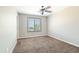 Neutral bedroom with carpet, ceiling fan, and window with blinds at 4277 N 180Th Ln, Goodyear, AZ 85395