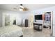 Bedroom with French doors at 43935 W Sagebrush Trl, Maricopa, AZ 85138