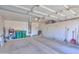 Spacious and clean garage featuring ample storage space for tools and equipment at 43935 W Sagebrush Trl, Maricopa, AZ 85138