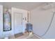 Clean garage corner with water heater and water softener system at 43935 W Sagebrush Trl, Maricopa, AZ 85138