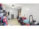 This garage is filled with storage and belongings at 43935 W Sagebrush Trl, Maricopa, AZ 85138
