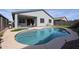 Beautiful backyard featuring a private pool and covered patio perfect for entertaining at 4593 W Bush Bean Way, San Tan Valley, AZ 85144