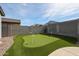 Enjoy outdoor recreation with a private putting green, great for practicing your golf game at 4593 W Bush Bean Way, San Tan Valley, AZ 85144