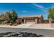 Charming single-story home with desert landscaping, driveway, and a two-car garage at 5232 N 186Th Dr, Litchfield Park, AZ 85340