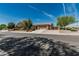 Charming single-story home with desert landscaping, driveway, and a two-car garage at 5232 N 186Th Dr, Litchfield Park, AZ 85340