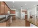 Open kitchen features stainless appliances, ample cabinet space, and a view to the dining room at 5232 N 186Th Dr, Litchfield Park, AZ 85340