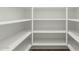 This pantry offers ample storage space with adjustable shelves, perfect for organizing your kitchen essentials at 5232 N 186Th Dr, Litchfield Park, AZ 85340