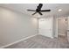 Clean bedroom with soft carpet and a closet enhances the comfort and storage at 6254 E Winchcomb Dr, Scottsdale, AZ 85254