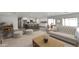 Open floor plan with living room, dining area, and a modern kitchen at 6254 E Winchcomb Dr, Scottsdale, AZ 85254
