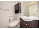 Bathroom featuring a modern toilet and vanity with updated fixtures at 6621 S Coral Gable Dr, Chandler, AZ 85249