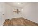 Bedroom with ceiling fan, wood-look floors, and window with blinds at 6621 S Coral Gable Dr, Chandler, AZ 85249