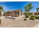 Beautiful home featuring desert landscaping and a functional wall for added charm at 6621 S Coral Gable Dr, Chandler, AZ 85249