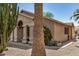 Side view of a home with desert landscaping and a mature palm tree at 6621 S Coral Gable Dr, Chandler, AZ 85249