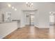 Bright, airy kitchen flowing into living area with wood floors and recessed lighting at 6621 S Coral Gable Dr, Chandler, AZ 85249