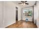 Bright room with wood floors and a view into the kitchen at 6621 S Coral Gable Dr, Chandler, AZ 85249