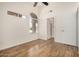 Bright main bedroom featuring wood floors, ample natural light, and neutral walls at 6621 S Coral Gable Dr, Chandler, AZ 85249