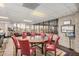 Bright meeting room offers a large round table, comfortable chairs, and scenic views at 6621 S Coral Gable Dr, Chandler, AZ 85249