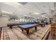 A large recreation room featuring multiple pool tables, ideal for entertaining and leisure at 6621 S Coral Gable Dr, Chandler, AZ 85249