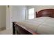 Comfortable bedroom featuring a large bed and closet with sliding doors at 709 E Dry Creek Rd, San Tan Valley, AZ 85143