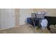 Spare bedroom showing clothes rack and boxes at 709 E Dry Creek Rd, San Tan Valley, AZ 85143