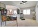 Relaxing bonus room area with a carpet, pinball machine, and exercise treadmill at 709 E Dry Creek Rd, San Tan Valley, AZ 85143