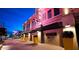 Commercial building exterior at night featuring illuminated signage and decorative planters at 742 E Kyle Dr, Gilbert, AZ 85296