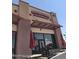 Flavors of India restaurant exterior showcasing signage, patio umbrellas, and a welcoming entrance at 742 E Kyle Dr, Gilbert, AZ 85296