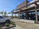 Black Rock Coffee Bar exterior with modern design, outdoor seating, and ample parking at 742 E Kyle Dr, Gilbert, AZ 85296