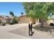 Attractive single-Gathering house with desert landscaping, a two-car garage, and a tile roof at 742 E Kyle Dr, Gilbert, AZ 85296