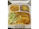 Delicious enchilada plate with rice, beans, and lettuce at 742 E Kyle Dr, Gilbert, AZ 85296