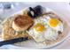 Plate of food with eggs, biscuit and hashbrowns at 742 E Kyle Dr, Gilbert, AZ 85296