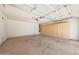 Open two-car garage with built-in storage cabinets and work area at 742 E Kyle Dr, Gilbert, AZ 85296