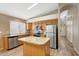 Bright kitchen featuring an island and stainless steel appliances at 742 E Kyle Dr, Gilbert, AZ 85296