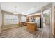 Modern kitchen with stainless steel appliances, a center island and plenty of light at 742 E Kyle Dr, Gilbert, AZ 85296