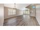 Bright living room with vaulted ceiling, hardwood floors, plantation shutters and view of front yard at 742 E Kyle Dr, Gilbert, AZ 85296