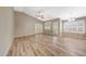 Bright and airy living room featuring vaulted ceiling and plantation shutters at 742 E Kyle Dr, Gilbert, AZ 85296