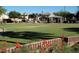 Expansive park with grassy area, playground, ramada and lush landscaping, perfect for outdoor activities at 742 E Kyle Dr, Gilbert, AZ 85296