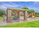 Community playground features a shaded picnic area and colorful play structure with a slide at 742 E Kyle Dr, Gilbert, AZ 85296