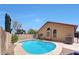 Backyard view of private pool and patio at 742 E Kyle Dr, Gilbert, AZ 85296
