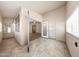Enclosed porch with tiled floor, view of living room, and abundant natural light at 742 E Kyle Dr, Gilbert, AZ 85296