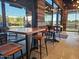 Stylish seating area with wood paneled walls and modern furniture inside a restaurant at 742 E Kyle Dr, Gilbert, AZ 85296