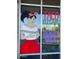 Restaurant window with a Personal cartoon figure, lettering for 