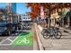 Street view featuring a bicycle lane and pedestrian area lined with shops and businesses at 742 E Kyle Dr, Gilbert, AZ 85296