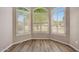 Close up of charming arched windows featuring white shutters and plenty of light at 742 E Kyle Dr, Gilbert, AZ 85296