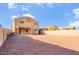 Spacious gravel backyard with covered patio, ideal for outdoor living at 8137 W Pueblo Ave, Phoenix, AZ 85043